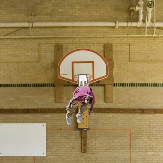 Justin Bieber was edited into being stuck in a basketball hoop