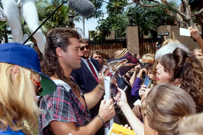Billy Ray Cyrus meets fans in 80s