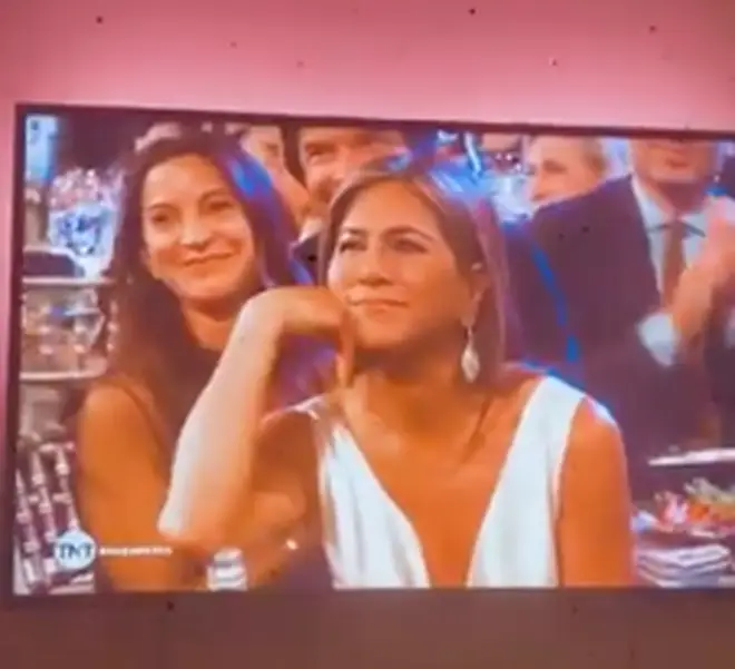 Jennifer Aniston gazes at Brad Pitt during his SAG speech