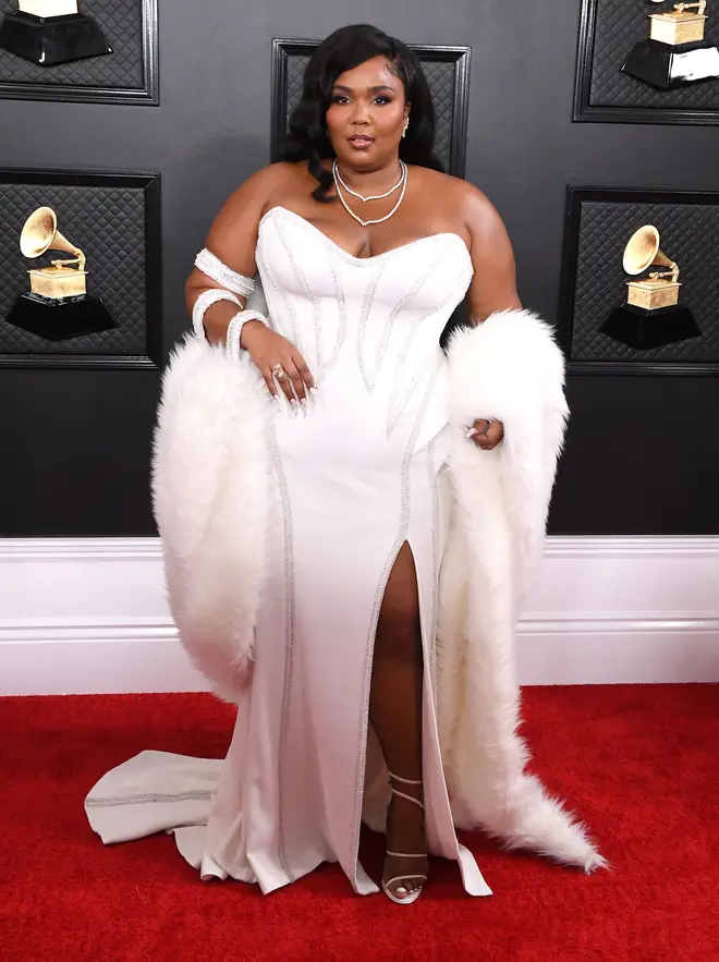 Lizzo rocked the red carpet in a white strapless gown