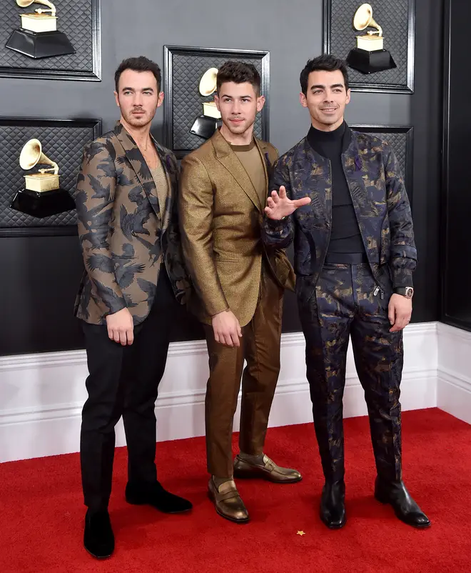 The Jonas Brothers matched in patterned ensembles