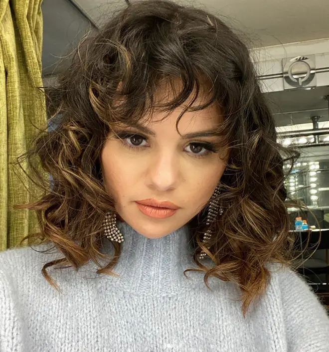 Selena Gomez has chopped her hair into voluminous curls