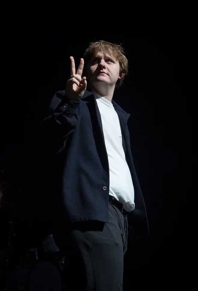 Lewis Capaldi sings on stage