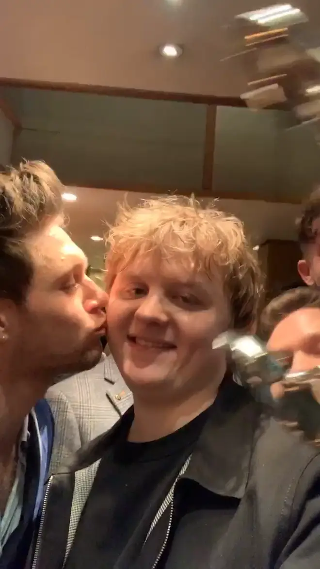 Niall Horan plants a kiss on Lewis Capaldi