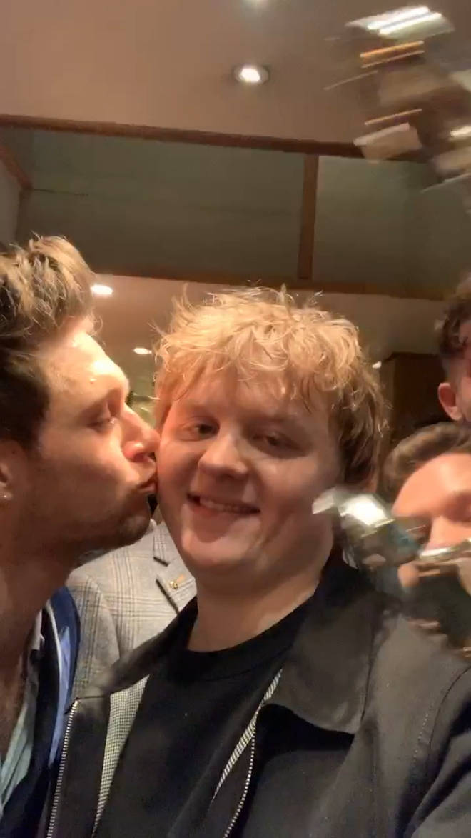 Niall Horan plants a kiss on Lewis Capaldi