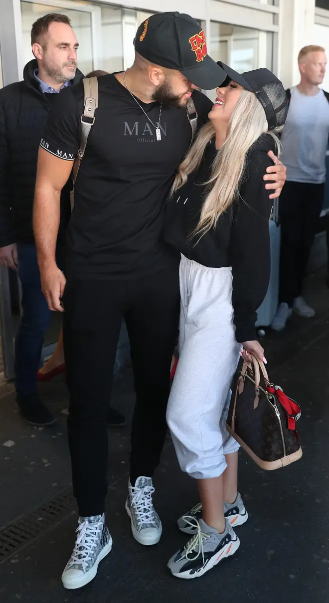 Love Island's Paige and Finn kiss at the airport