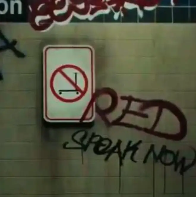 'The Man' features a 'no Scooter' sign by her album titles