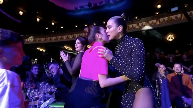 Dua Lipa gave her siblings a kiss before accepting her Global award