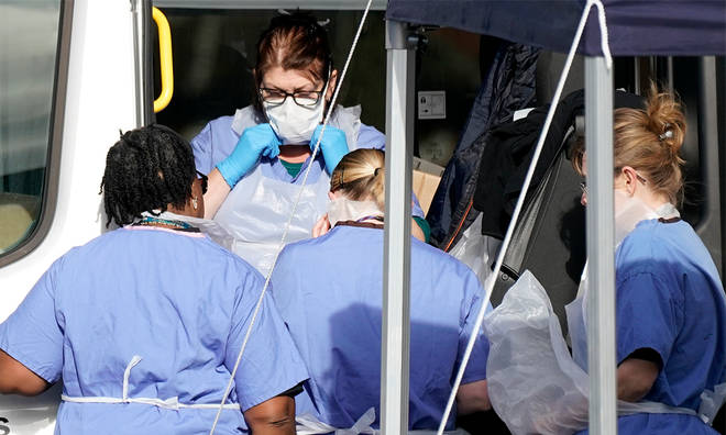 NHS workers prepare to test people for Coronavirus