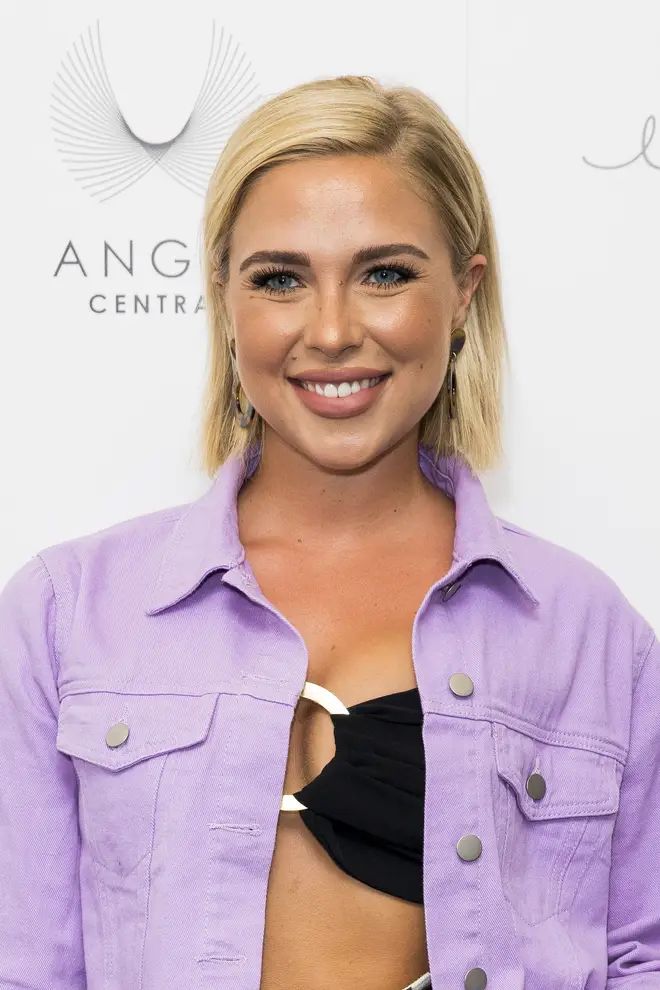 Love Island's Gabby Allen smiling at event