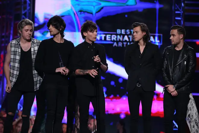 One Direction on stage in 2014