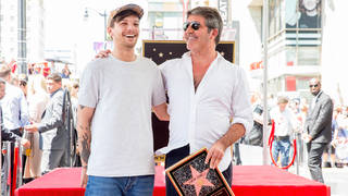 Louis Tomlinson leant on Simon Cowell after his mum's death.