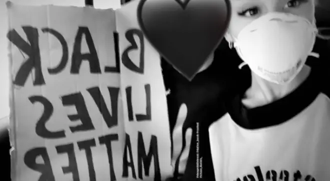 Ariana Grande marched with a 'black lives matter' placard