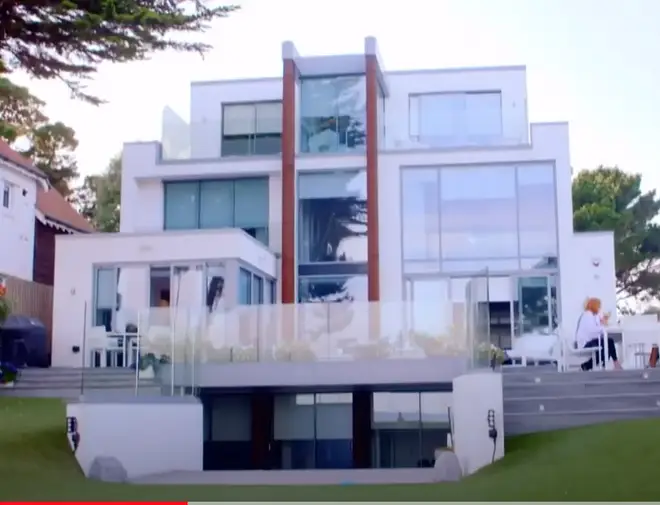 Harry Redknapp and Sandra's seaside mansion features four levels of glass fronted walls
