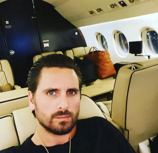 Scott Disick struggles to talk about his parents.