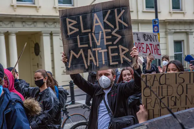 Protesters with placards at Whitehall Downing Street during...