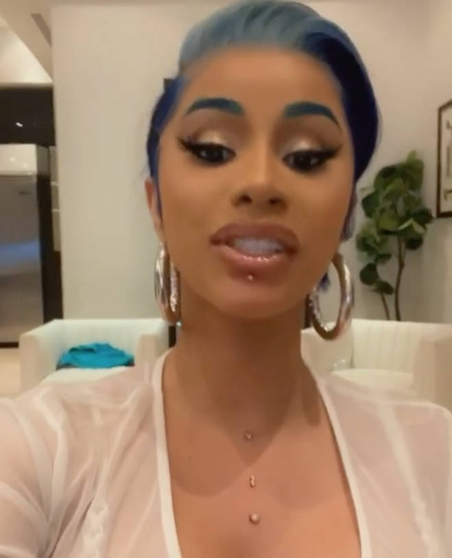 Cardi B had her chest and below her lip pierced