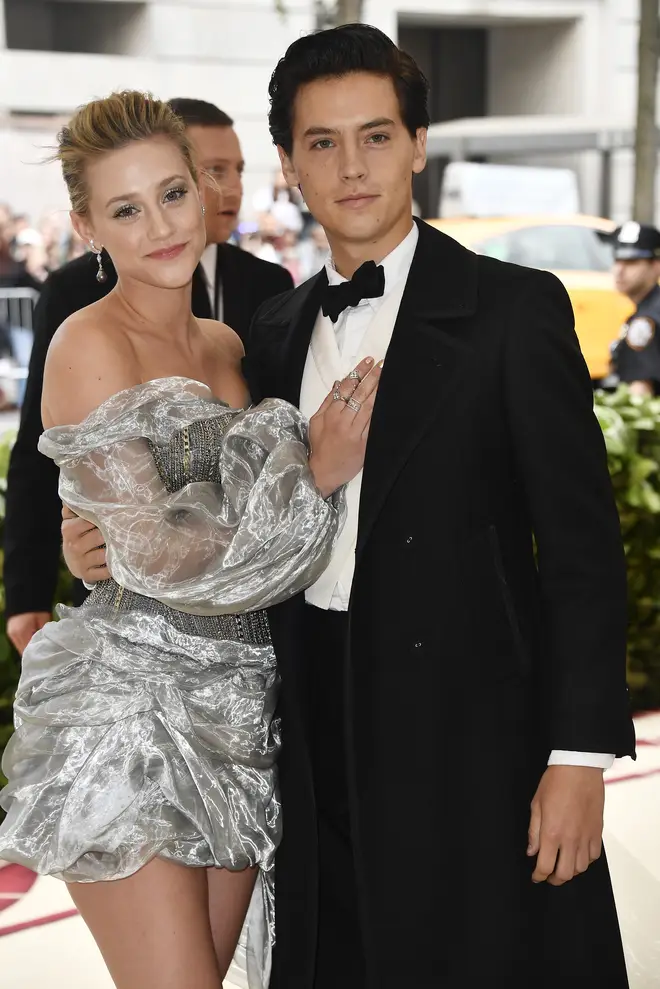 Lili Reinhart and Cole Sprouse walk the red carpet at the 2018 Met Gala together