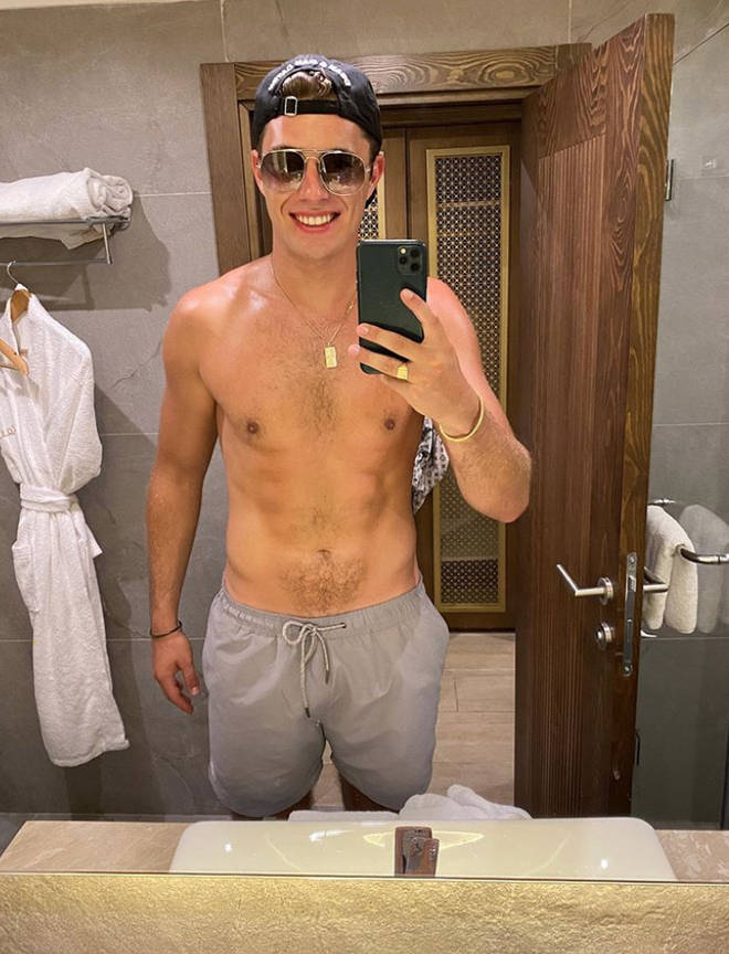 Curtis Pritchard can't stop showing off his chiselled abs