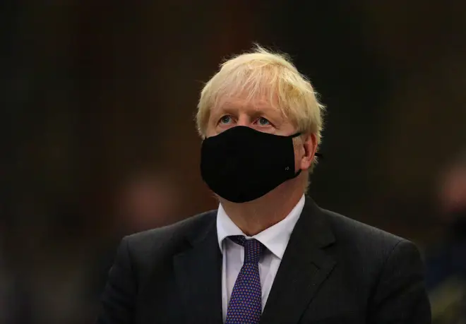 Boris Johnson wears a mask to a service at Westminster Abbey