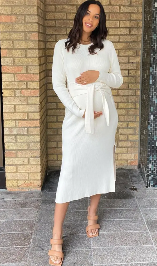 Rochelle highlighted her bump in a figure-hugging midi dress