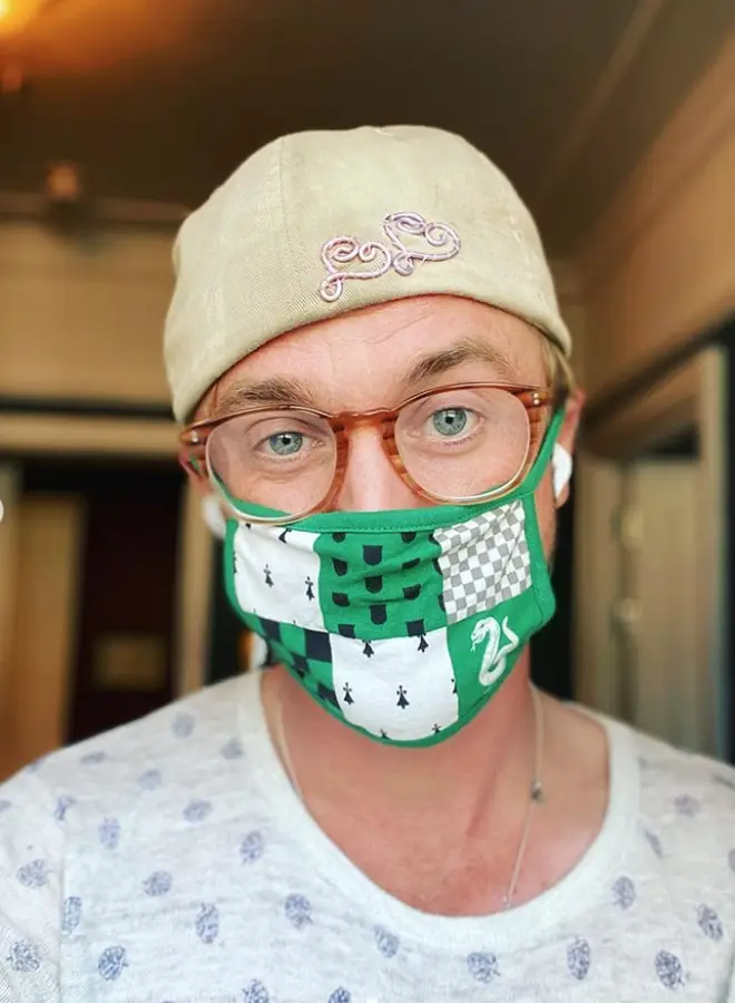 Tom Felton is giving away a Slytherin face covering