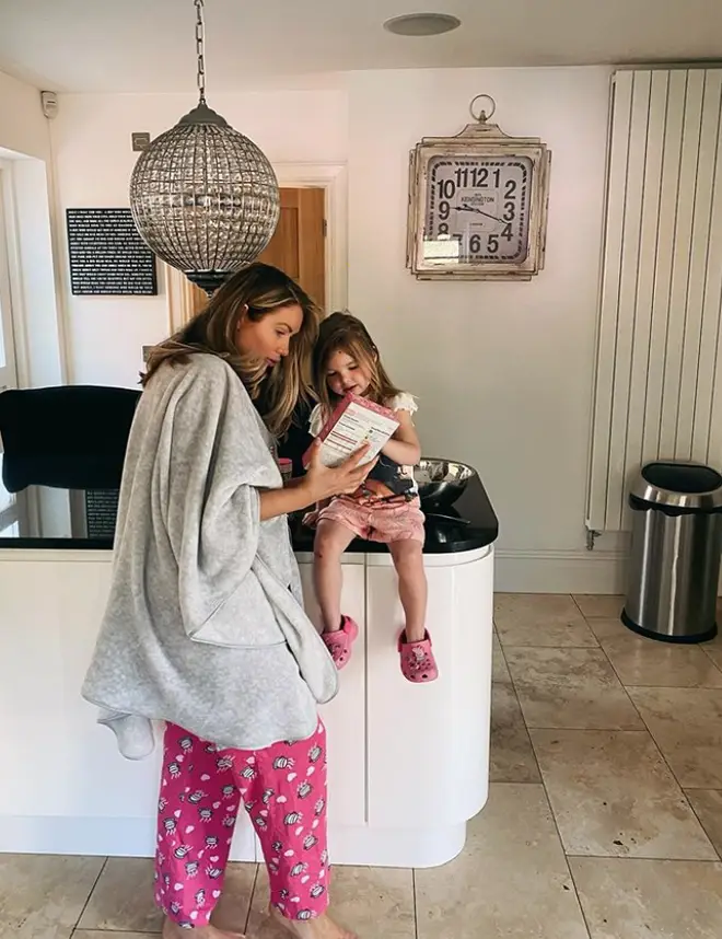 Amy Childs' kitchen is a sleek black and white theme