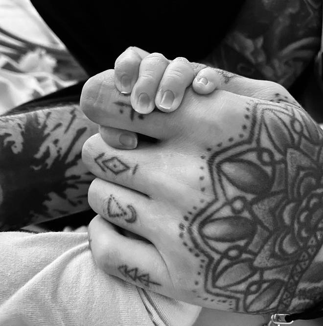 Gigi and Zayn shared photos of their baby girl's tiny hand to announce her birth.