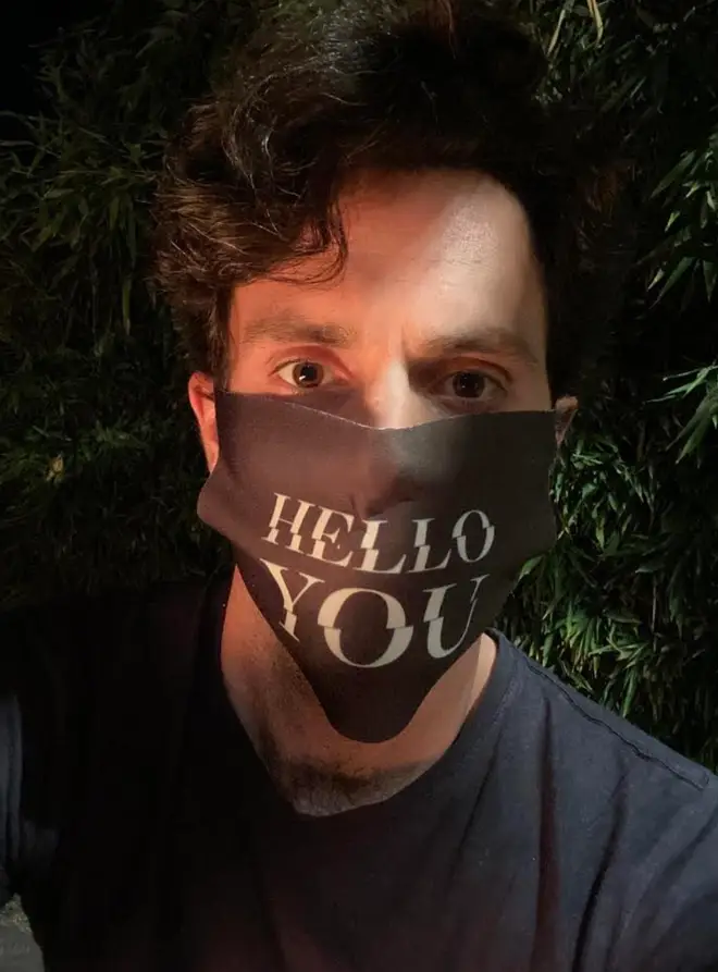 Netflix shared this apt picture of Penn Badgley on set of You