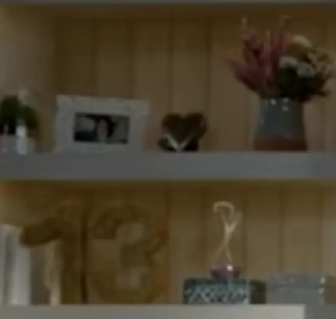 Tayolr's lucky number and an hour glass were also on the shelves