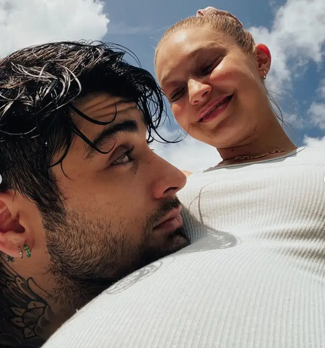 Zayn rested his head on Gigi's bump in a rare joint selfie