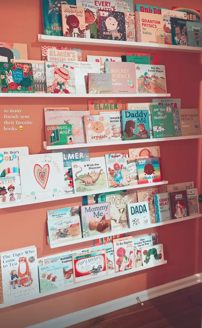 Gigi and Zayn's baby has a wall of shelves full of books