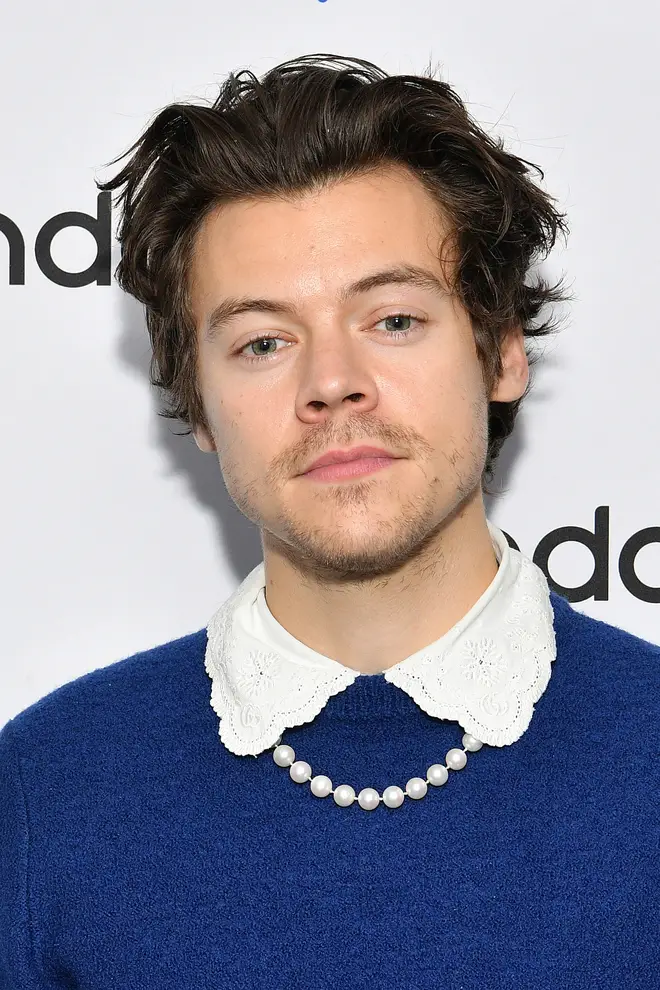 Harry Styles loves a pearl necklace