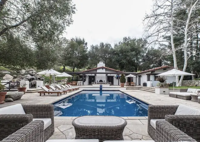 The mansion's best feature is the sprawling outdoor pool area