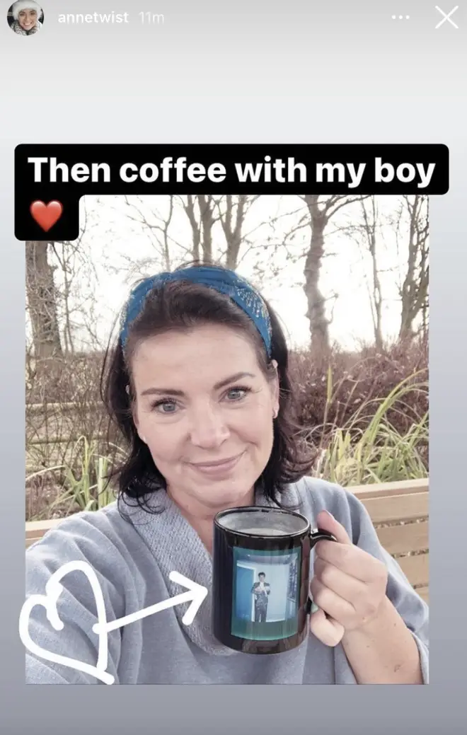 Anne Twist drinks coffee from her Harry Styles mug