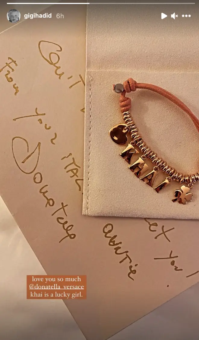 Donatella Versace gifted Khai a personalised bracelet