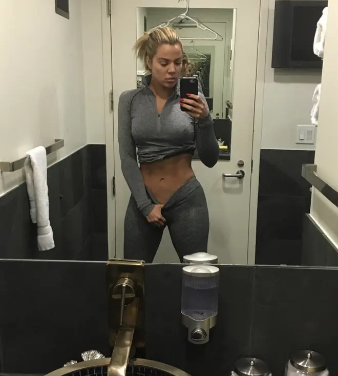 Khloé Kardashian proudly shows off her abs after shedding over 2 stone