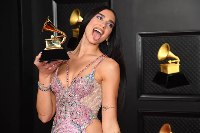 Dua Lipa showcased three stunning Versace outfits at the Grammys.