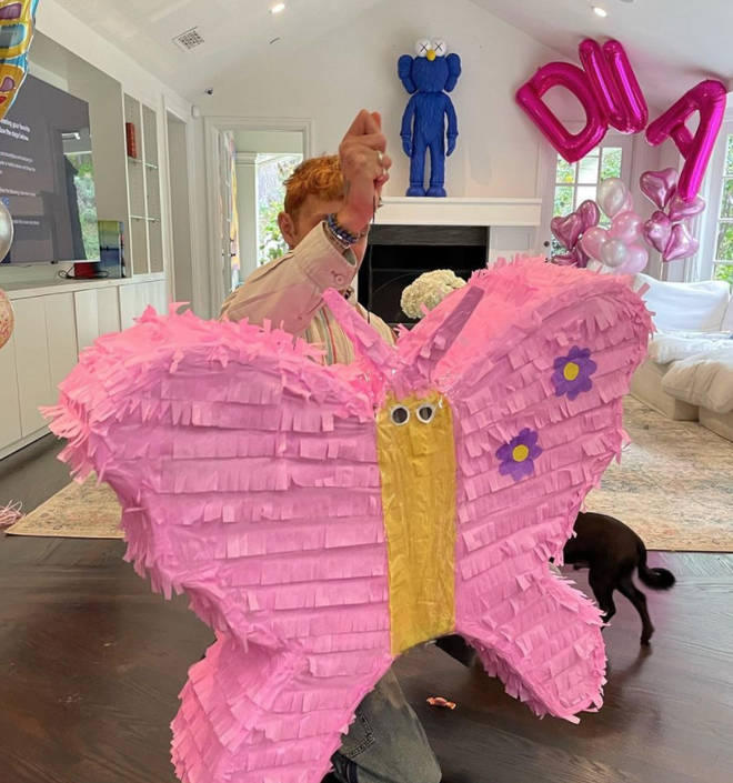 Anwar Hadid bought Dua Lipa a butterfly piñata and butterfly balloons