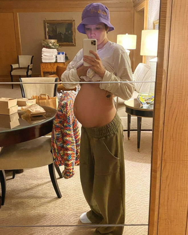 Halsey gave fans an update on her blossoming baby bump