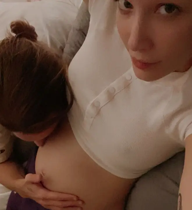 Halsey's boyfriend kisses her baby bump