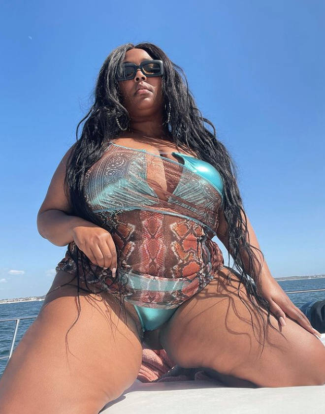 Lizzo was pictured with a mystery man while living her best life in Malibu