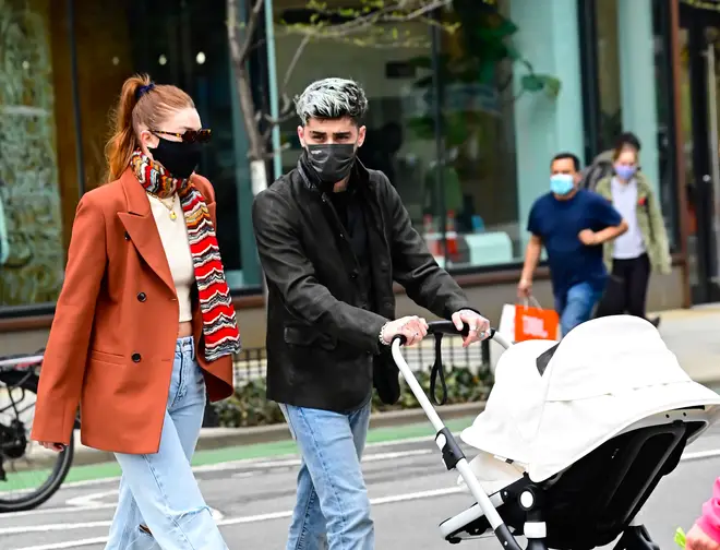 Zayn Malik and Gigi Hadid took baby Khai for a stroll in NYC.