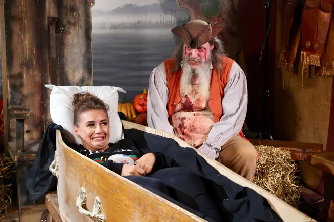 Dani Dyer was sat in a coffin, with snakes and spiders