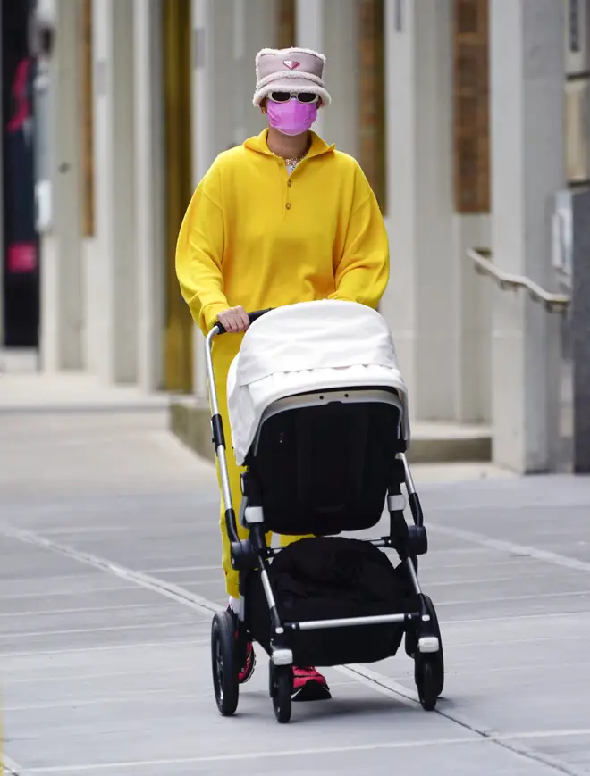 Gigi Hadid on a stroll through NYC with baby Khai.