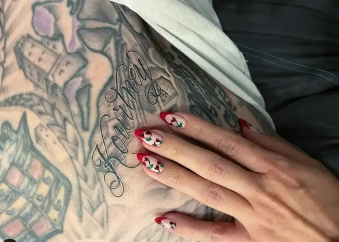 Kourtney Kardashian showed off Travis' new tattoo for her