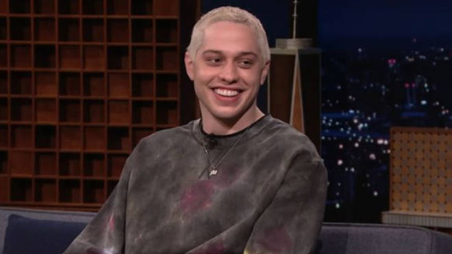 Pete Davidson wore a 'PD' necklace as a tribute to Phoebe Dynevor on The Tonight Show Starring Jimmy Fallon.