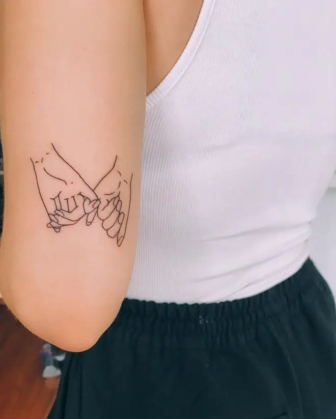 Anne-Marie got a pinky promise tattoo alluding to her 'To Be Young' lyrics.