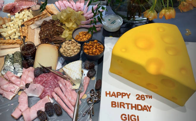 Gigi Hadid had an incredible birthday cake shaped like a slice of cheese.