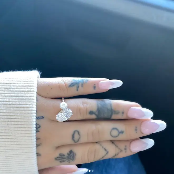 Ariana Grande received a custom engagement ring from Dalton Gomez in December